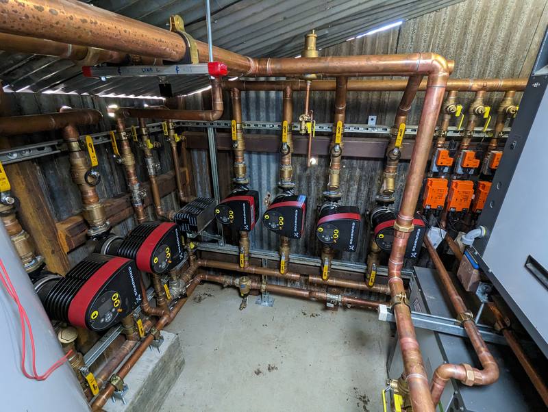 Mechanical room with copper headers, circulation pumps and control valves